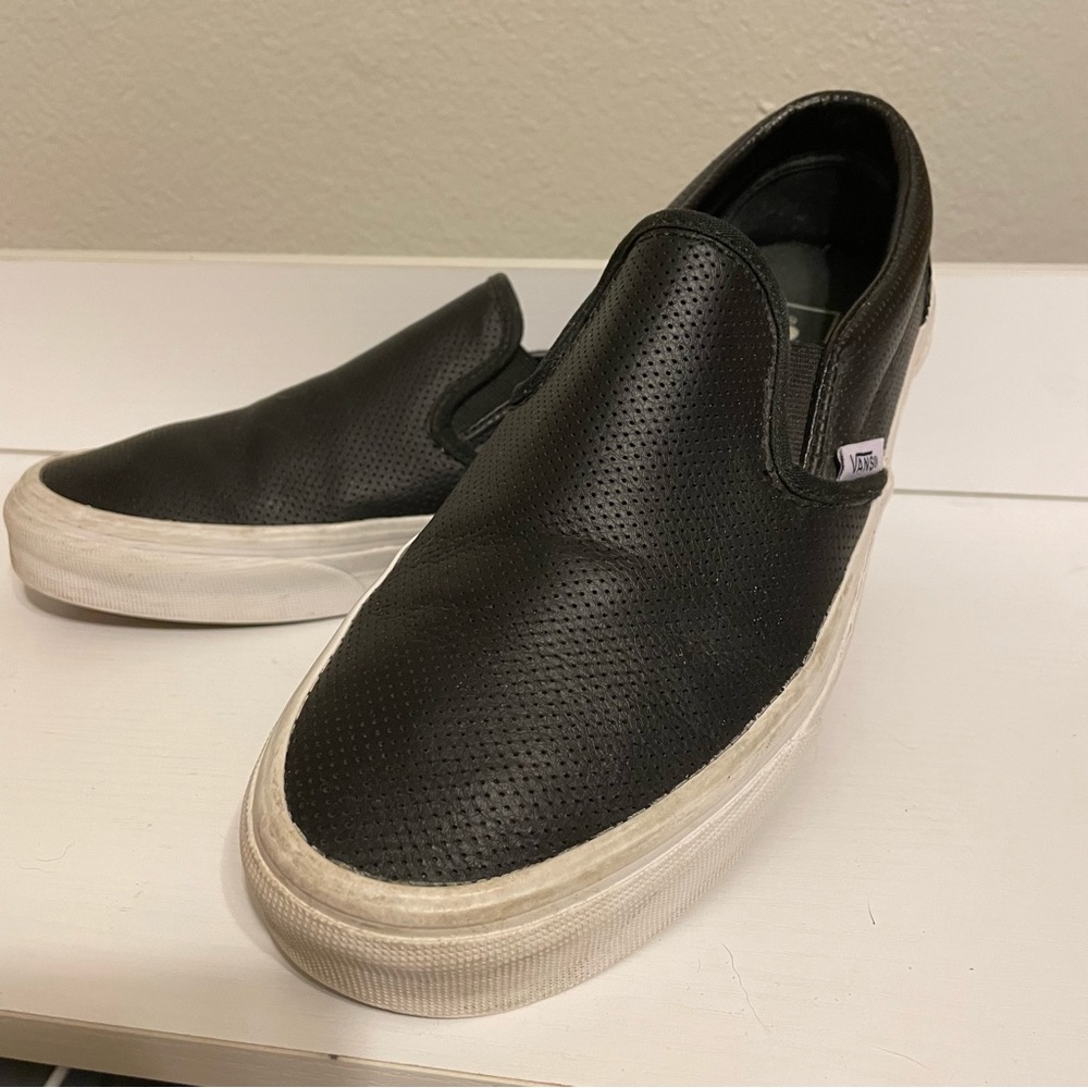 Women black leather slip on Vans size 8
